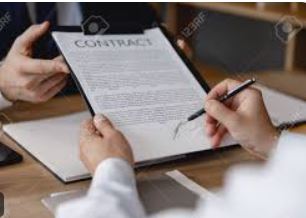 Realtor reviewing real estate contract contingencies with clients – Cindy Burkhardt Citrus County Realtor