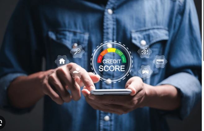 Homebuyer checking their credit score on a smartphone while preparing to purchase a home in Citrus County Florida.