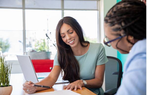 Real estate buyer’s agent reviewing home purchase details with a client in Citrus County Florida