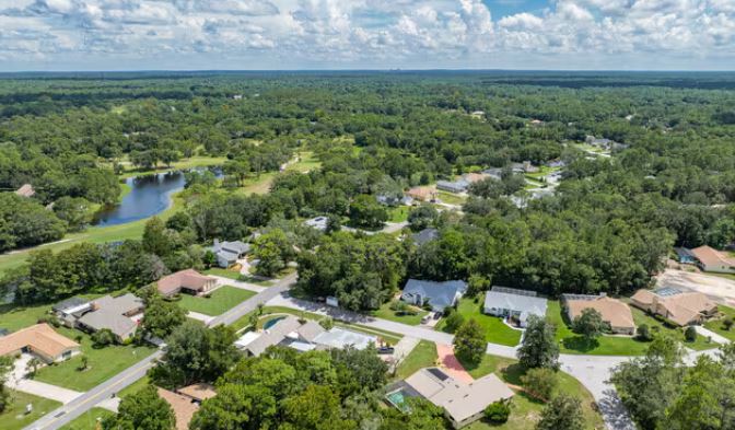 Sugar Mill Woods FL golf course and nature greenbelt homes — represented by Cindy Burkhardt, Best Realtor in Sugar Mill Woods FL.