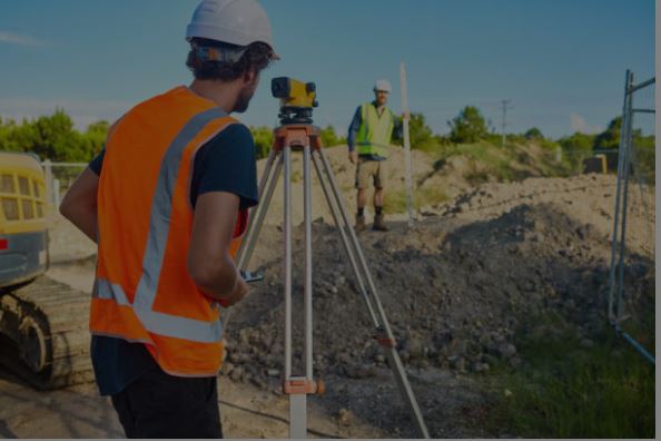 Land surveyors measuring property boundaries during a home purchase in Citrus County Florida
