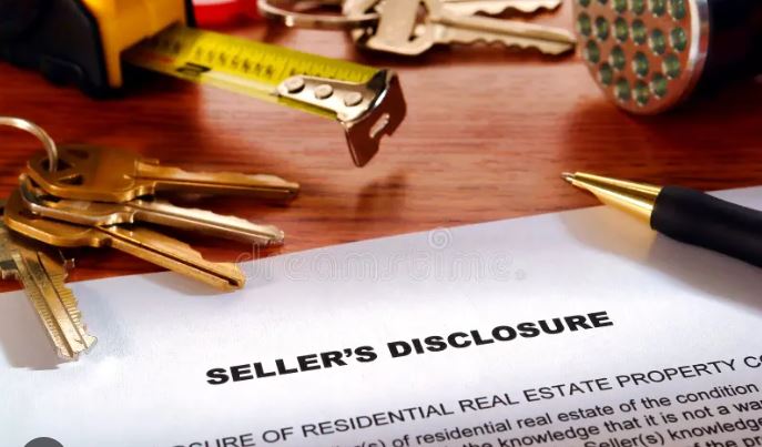 Seller property disclosure Florida form with house keys on a table